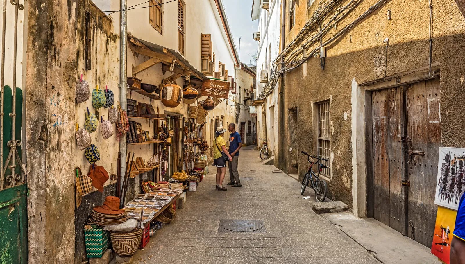 Stalls and traders in the Darajani market in Stone Town