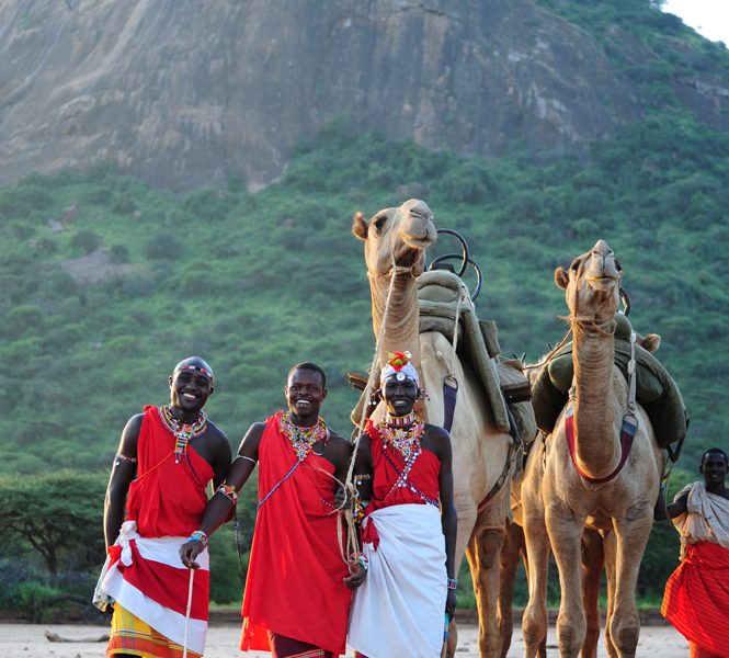 Walking safari guides with camels, Kenya